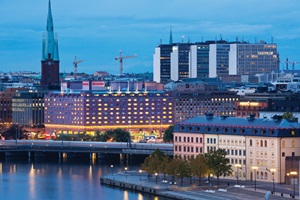 Aerial of buildings and Riddarfjärden bay, Lake Mälaren at night