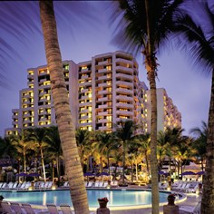 Exterior of pool and building at dusk"Most Commonly Used" property view