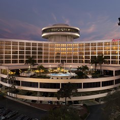 Exterior view of hotel and pool at dusk"Most Commonly Used" property view