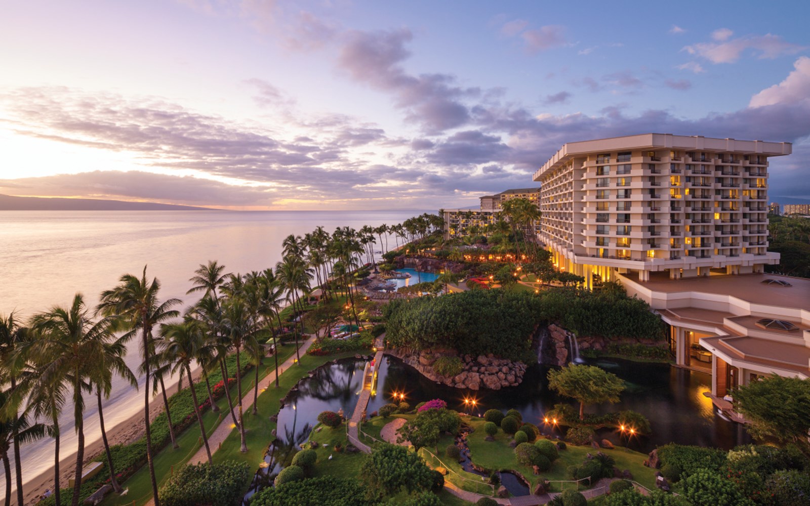 Aerial of entire property and ocean at dusk"Most Commonly Used" property view