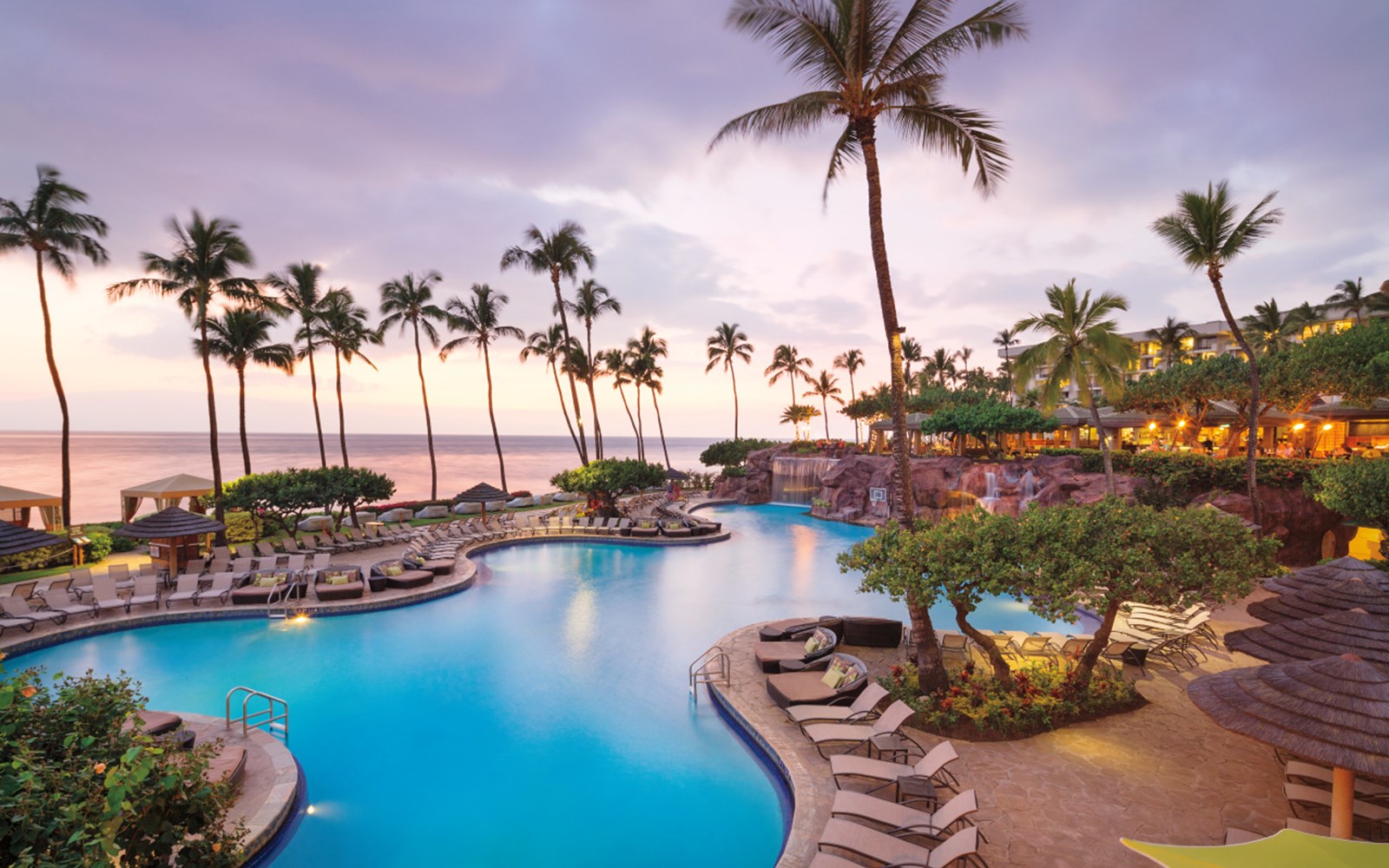 Exterior view of pool at dusk