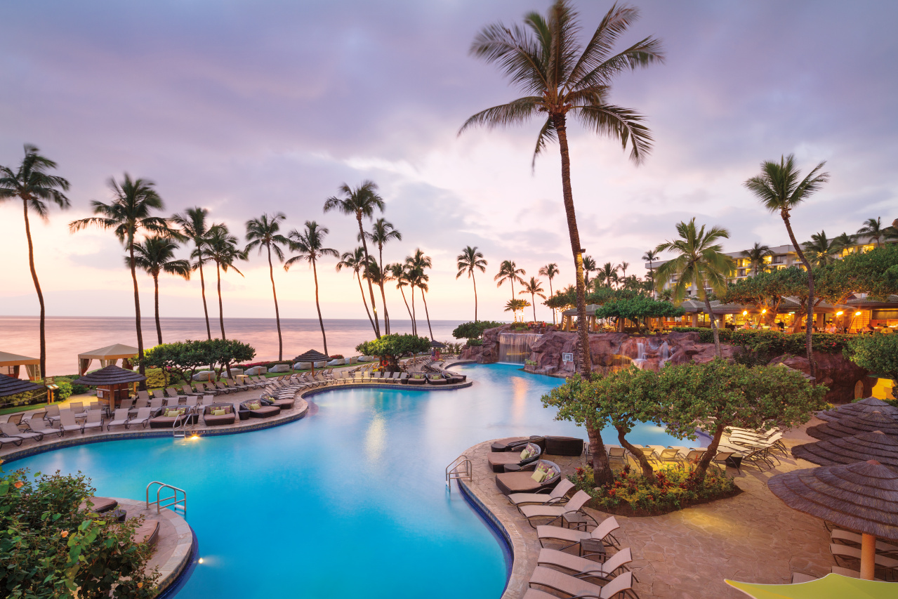 Exterior view of pool at dusk