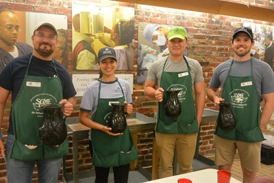 Host volunteers will helped prepare and serve meals to guests at SOME’s (So Others Might Eat) Dining Room, sorted donations and assembled food bags.